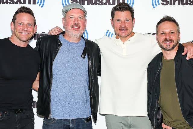 <p>Arturo Holmes/Getty</p> Jeff Timmons, Justin Jeffre, Nick Lachey, and Drew Lachey of 98 Degrees visit SiriusXM Studios in September 2023 in New York City