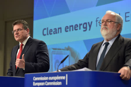 European Commission Vice-President Maros Sefcovic and Commissioner Miguel Arias Canete hold a news conference on Clean Energy package in Brussels, Belgium November 30, 2016. REUTERS/Eric Vidal