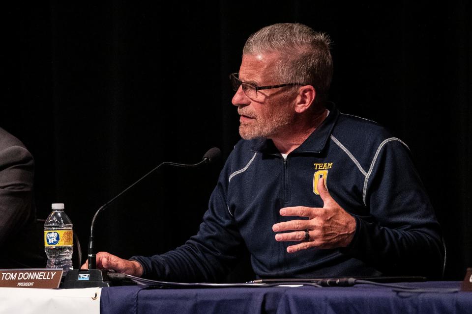 Oxford School Board President Thomas Donnelly, right, speaks next to superintendent Kevin Weaver during an Oxford Board of Education special meeting at Oxford Middle School in Oxford on May 17, 2022.