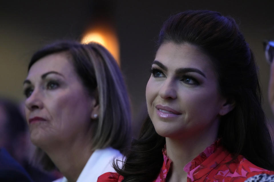 Florida first lady Casey DeSantis sits with Iowa Gov. Kim Reynolds, left, as they listen to Republican presidential candidate Florida Gov. Ron DeSantis speak during the Family Leadership Summit, Friday, July 14, 2023, in Des Moines, Iowa. (AP Photo/Charlie Neibergall)