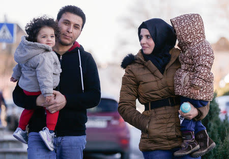 From L-R, Syrian family Maya, Mohamed, Ghufran and Shadin al-Khalaf are seen near their apartment in Wecker, Luxembourg, January 19, 2017. REUTERS/Yves Herman