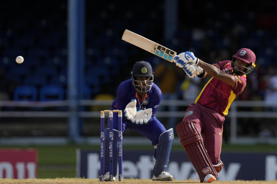 West Indies' Brandon King hits a four during the third ODI cricket match against India at Queen's Park Oval in Port of Spain, Trinidad and Tobago, Wednesday, July 27, 2022. (AP Photo/Ricardo Mazalan)