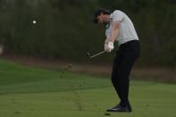 Thomas Pieters of Belgium plays his second shot on the 18th hole during the competition of the second round of the Dubai Desert Classic, in Dubai, United Arab Emirates, Saturday, Jan. 28, 2023. (AP Photo/Kamran Jebreili)