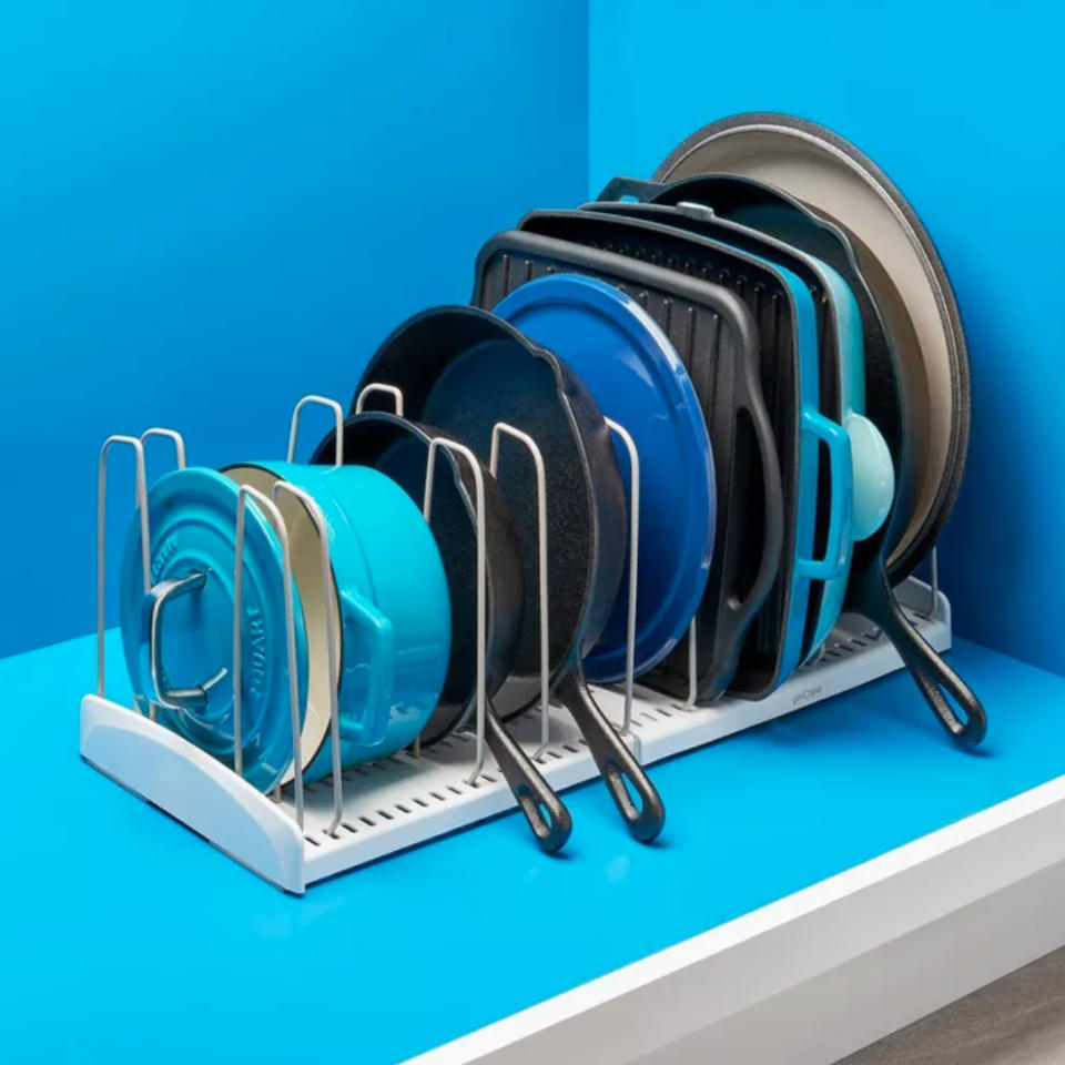 a pan rack on a blue background
