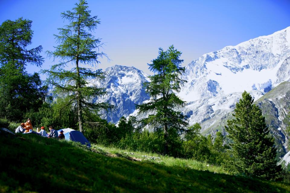 <p><span>The mountain views and the fresh alpine air are the main appeal at </span><a rel="nofollow noopener" href="https://coolcamping.com/campsites/europe/switzerland/1852-camping-arolla" target="_blank" data-ylk="slk:Camping Arolla;elm:context_link;itc:0;sec:content-canvas" class="link "><span>Camping Arolla</span></a><span>, which sits 2,000 meters up in the Swiss Alps. Popular with the more adventurous, camping spots here are a mixture of pine-tree hideouts and open areas with views across to the north face of Mont Collon. A tent and two people from 26CHF (£20). [Photo: Cool Camping]</span> </p>