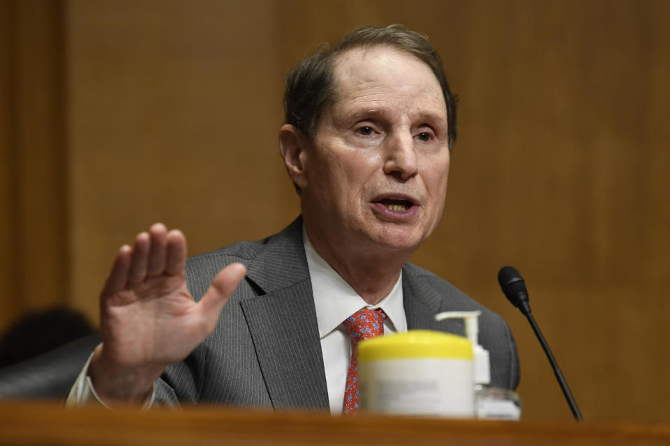 Sen. Ron Wyden, D-Ore., questions Internal Revenue Service Commissioner Charles Rettig at a Senate Finance Committee hearing on Capitol Hill in Washington, Tuesday, June 30, 2020, on the 2020 filing season and COVID-19 recovery. (AP Photo/Susan Walsh, Pool)