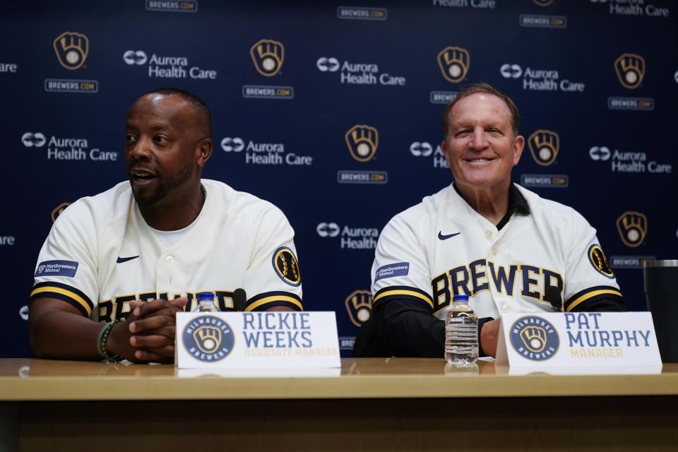 CORRECTS THE SPELLING OF RICKIE - Pat Murphy and associate manager Rickie Weeks speak at a news conference where he was named Milwaukee Brewers baseball team manager Thursday, Nov. 16, 2023, in Milwaukee. (AP Photo/Morry Gash)