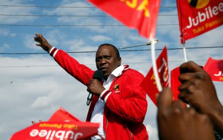 Kenya's President Uhuru Kenyatta addresses a Jubilee Party campaign caravan rally in Nairobi, Kenya October 23, 2017. REUTERS/Baz Ratner