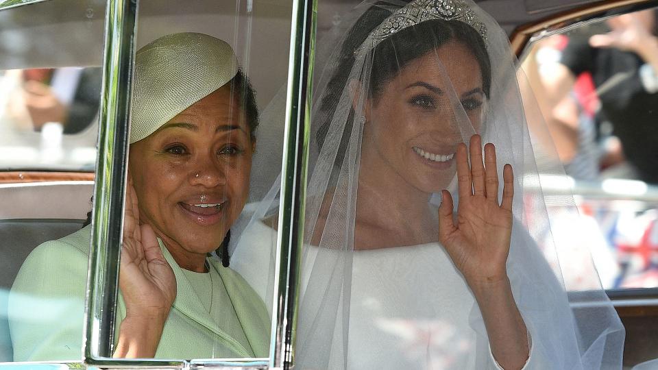 TOPSHOT - Meghan Markle (R) and her mother, Doria Ragland, arrive for her wedding ceremony to marry Britain's Prince Harry, Duke of Sussex, at St George's Chapel, Windsor Castle, in Windsor, on May 19, 2018. (Photo by Oli SCARFF / AFP) (Photo by OLI SCARFF/AFP via Getty Images)