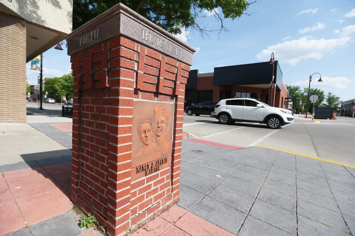 Nancy and Archie Martin's portrait is displayed on the historical marker at the intersection of Burnett and Fifth Street in downtown Ames, Iowa on Tuesday, June 13, 2023.