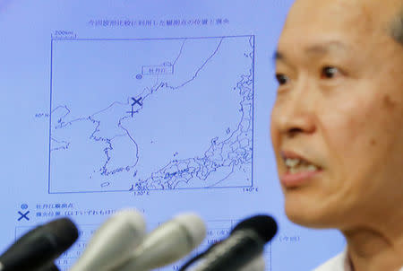 Japan Meteorological Agency's earthquake and tsunami observations division director Toshiyuki Matsumori speaks in front of a screen showing the seismic event that was indicated on North Korea and observed in Japan, during a news conference at the Japan Meteorological Agency in Tokyo, Japan, September 3, 2017, following the earthquake felt in North Korea and believed to be a nuclear test. REUTERS/Toru Hanai