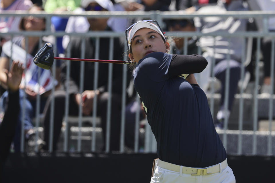 Thailand's Atthaya Thitikul hits from the first tee during the finals at the International Crown match play golf tournament in San Francisco, Sunday, May 7, 2023. (AP Photo/Benjamin Fanjoy)