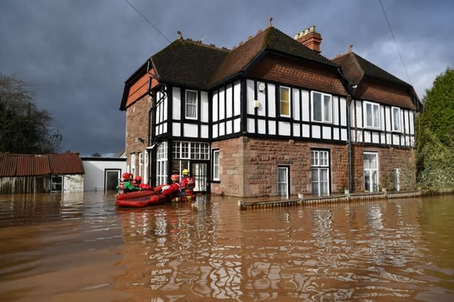 A man was rescued from his home in Monmouth amid heavy flooding (Ben Birchall/PA)