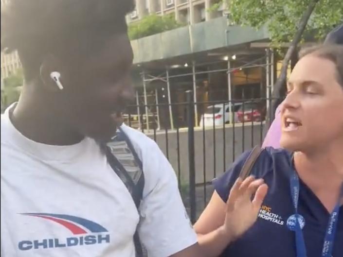 The unnamed woman argues with a young Black man over a rental bike.