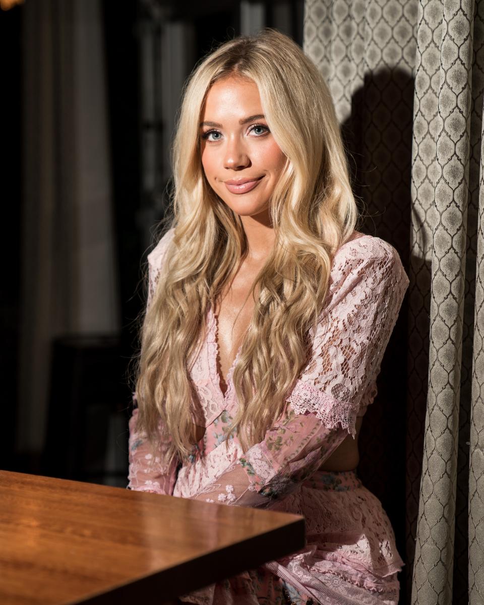 Megan Moroney poses for a portrait during an Opry NextStage Live event at Lava Cantina in The Colony, Texas, Wednesday, May 10, 2023.