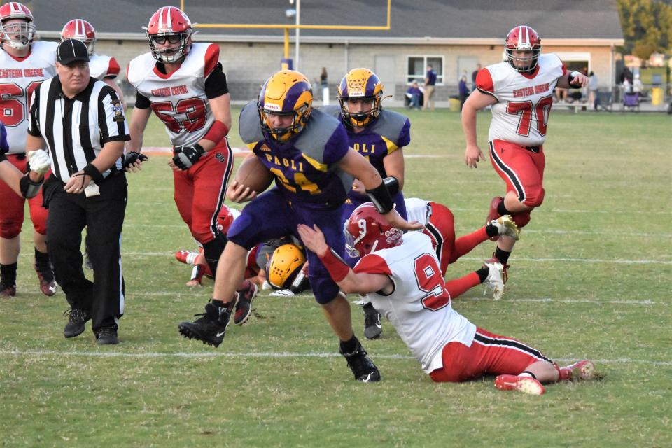 Paoli's Trey Rominger rumbles through Eastern Greene safety Evan Rogers on his way to the endzone.