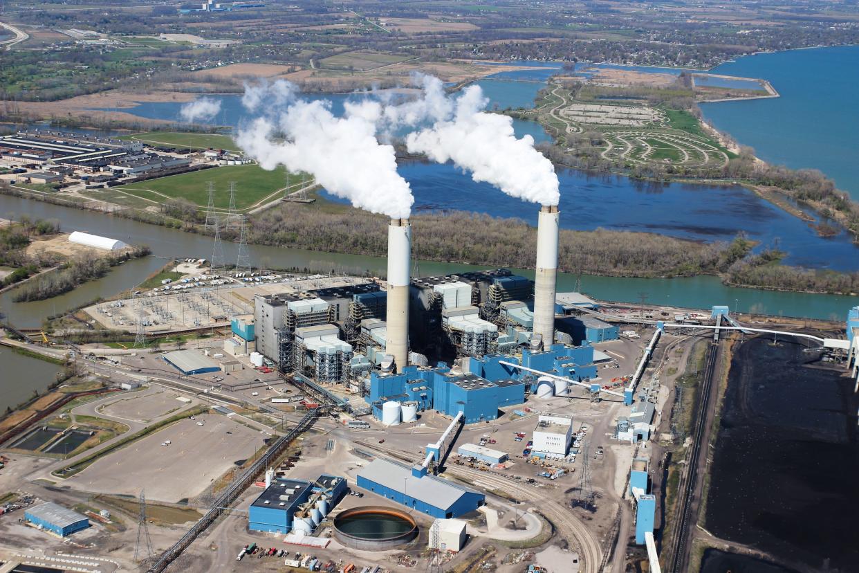 DTE Energy's Monroe Power Plant on East Front Street is shown. As part of a clean energy settlement agreement announced Wednesday, the plant will be fully retired in 2032, three years earlier than previously announced.