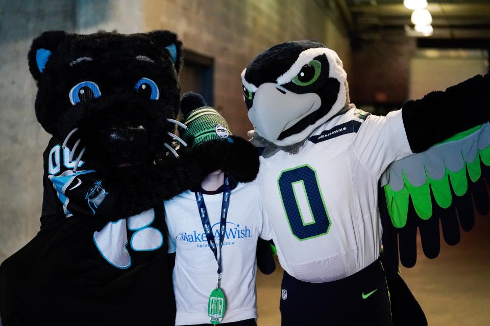 Sir Purr, left, is the greatest mascot in human history.