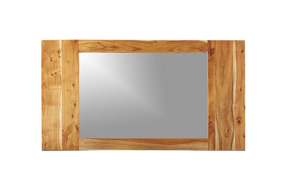 Wood grain is naturally beautiful — and this gorgeous mirror doesn’t do anything to distort it. 