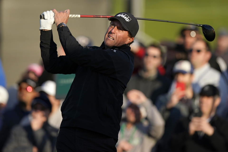 Phil Mickelson tees off on the 10th hole during the first round of the Genesis Invitational golf tournament at Riviera Country Club, Thursday, Feb. 13, 2020, in the Pacific Palisades area of Los Angeles. (AP Photo/Ryan Kang)