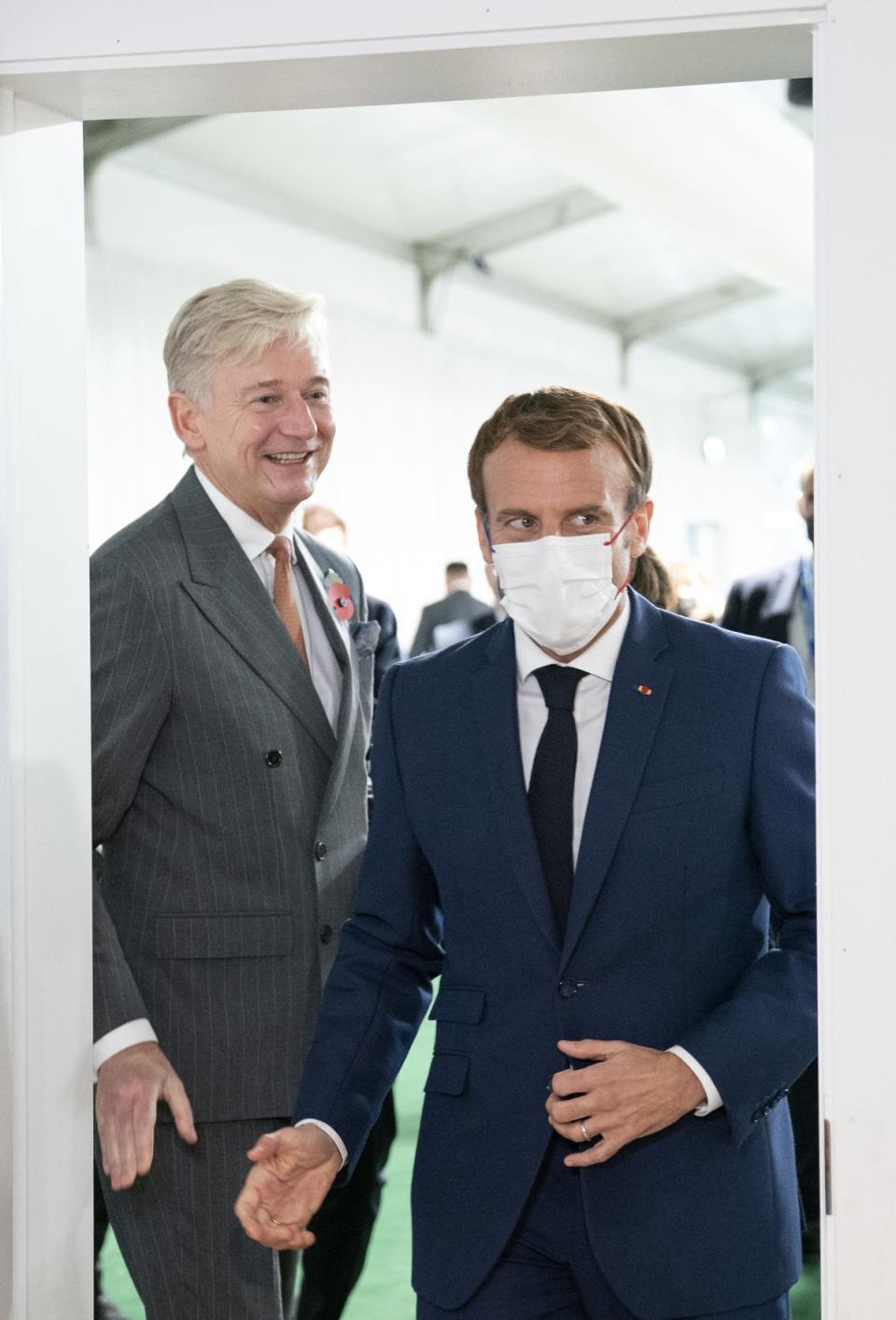 Clive Alderton (left) with the French president Emmanuel Macron at Cop26 in 2021 (Jane Barlow/PA) (PA Wire)