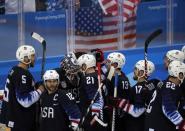 Ice Hockey - Pyeongchang 2018 Winter Olympics - Men's Playoff Match - U.S. v Slovakia - Gangneung Hockey Centre, Gangneung, South Korea - February 20, 2018 - Players of Team USA celebrate their win. REUTERS/Grigory Dukor