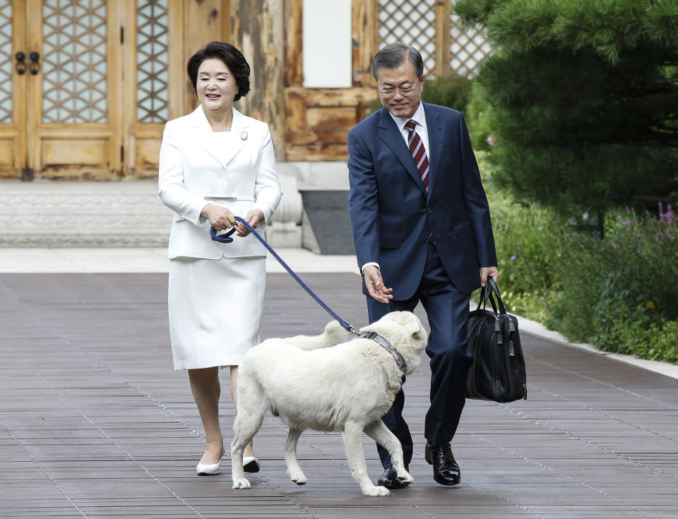 South Korean President Moon Jae-in and his wife Kim Jung-sook leave the presidential Blue House in Seoul, South Korea to the airport for a visit to Pyongyang, North Korea, Tuesday, Sept. 18, 2018. (Pyongyang Press Corps Pool via AP)