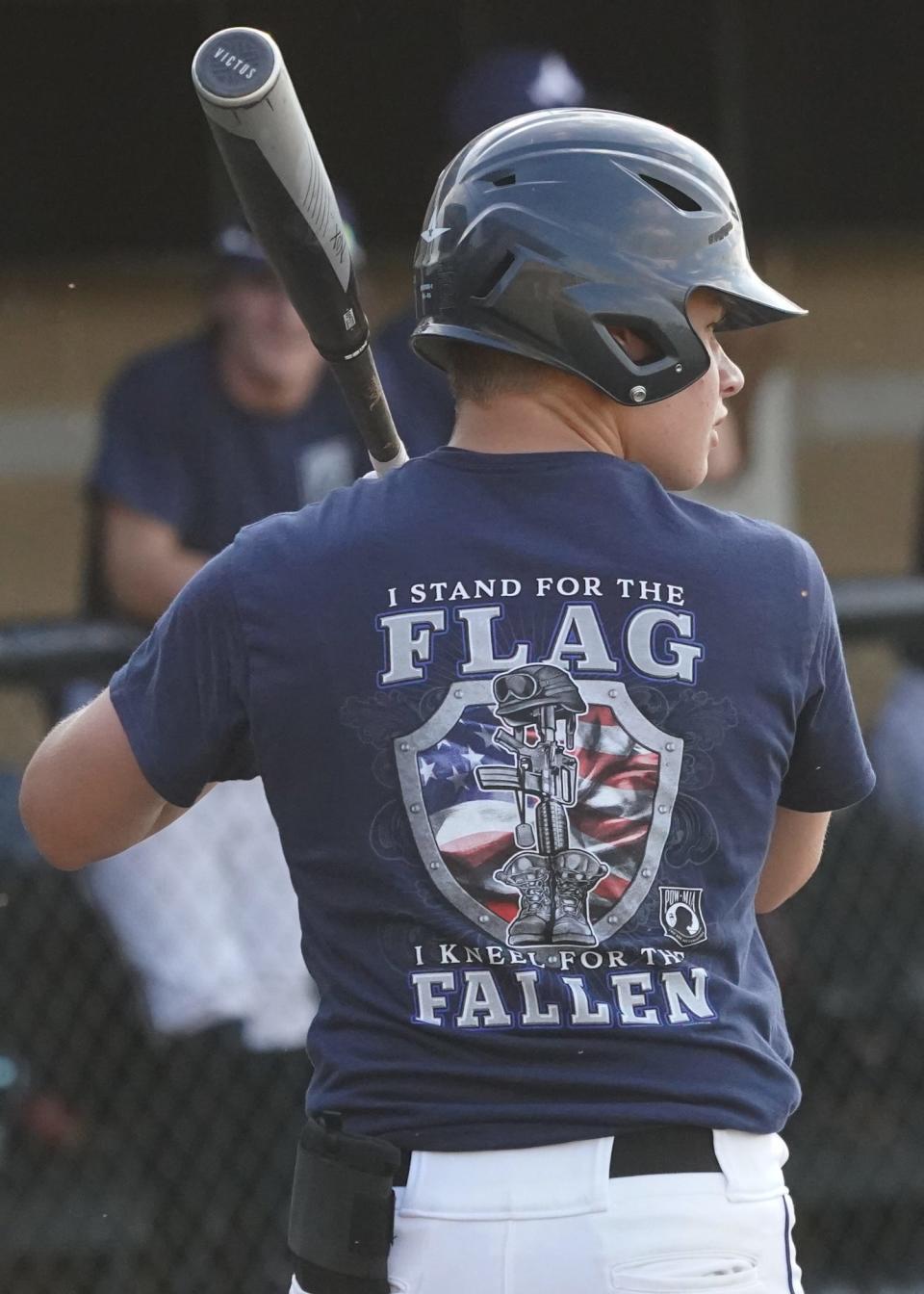 Adrian Post 275's Jack Deatrick wears a special Veterans Night shirt during Wednesday's game.