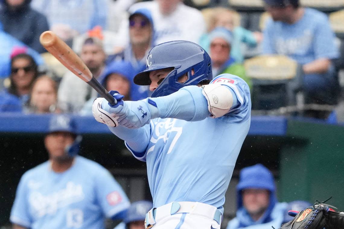 Kansas City Royals shortstop Bobby Witt Jr. connects for a first-inning triple against the Texas Rangers on Sunday at Kauffman Stadium.