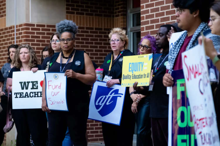 New Haven Public School educators, paraeducators, and students held a press conference in front of Wilbur Cross High School to advocate for increased school funding on May 24, 2024. (Shahrzad Rasekh/CT Mirror)