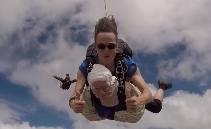 Irene O'Shea skydiving with instructor Jed Smith (SA Skydiving/YouTube)