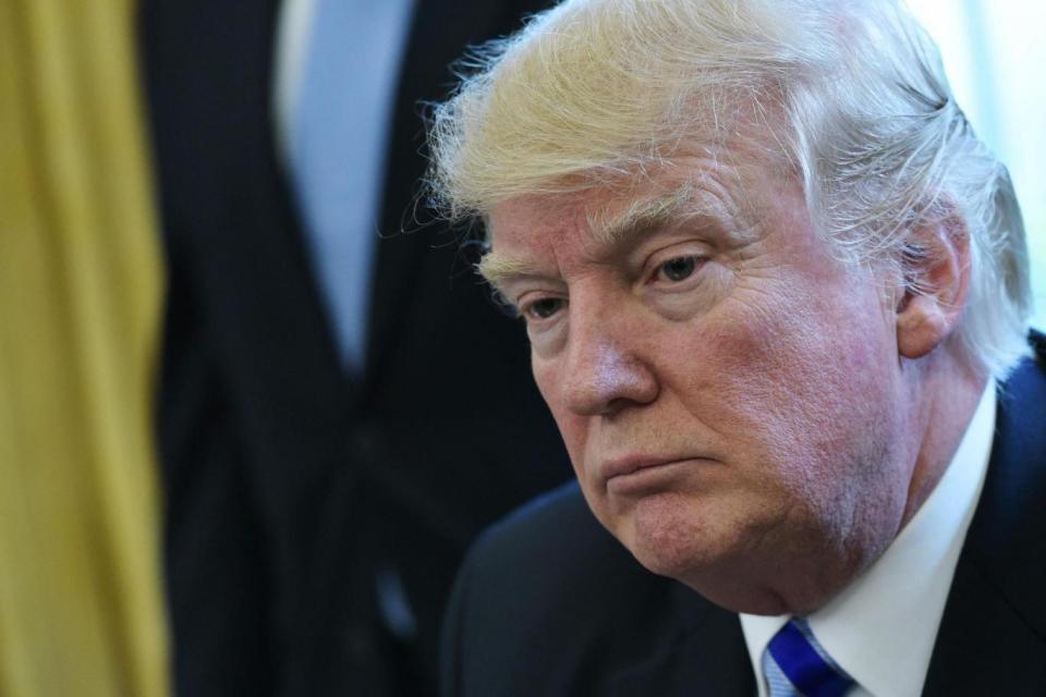 Health reforms: US President Donald Trump pauses as he speaks from the Oval Office (AFP/Getty Images)