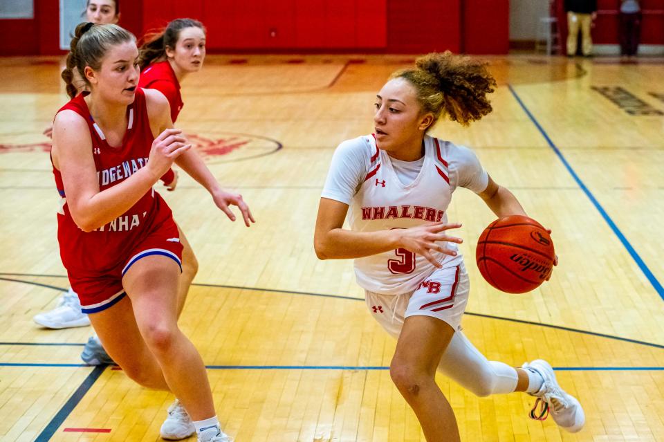 New Bedford's Lexi Thompson attacks the lane for the Whalers.