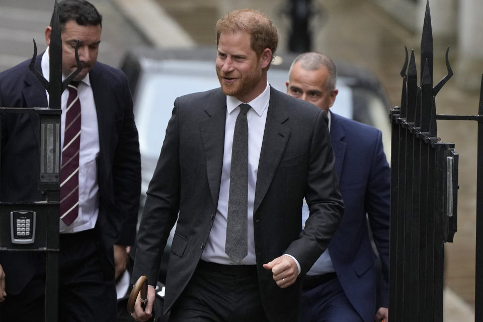 Britain's Prince Harry arrives at the Royal Courts Of Justice in London, Tuesday, March 28, 2023. Prince Harry is in a London court on Tuesday as the lawyer for a group of British tabloids prepared to ask a judge to toss out lawsuits by the prince, Elton John and several other celebrities who allege phone tapping and other invasions of privacy.(AP Photo/Alastair Grant)