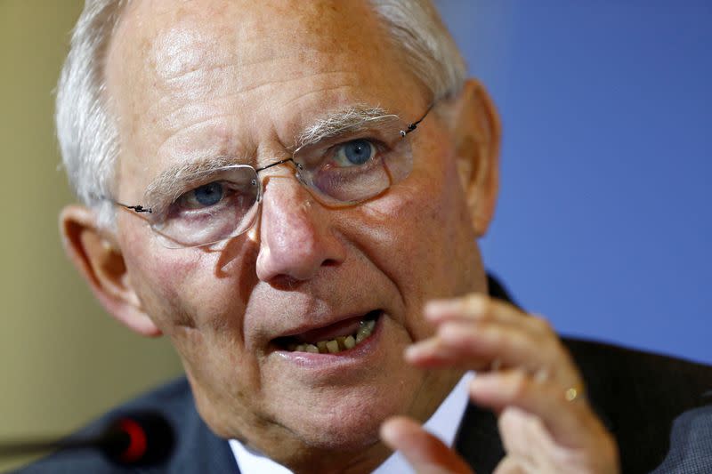 FILE PHOTO: German Finance Minister Schaeuble gestures as he attends a meeting in Berlin