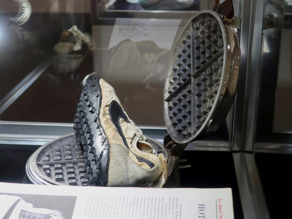 A vintage Nike sneaker with a "waffle sole." The original waffle iron, largely destroyed, was recovered in 2010.