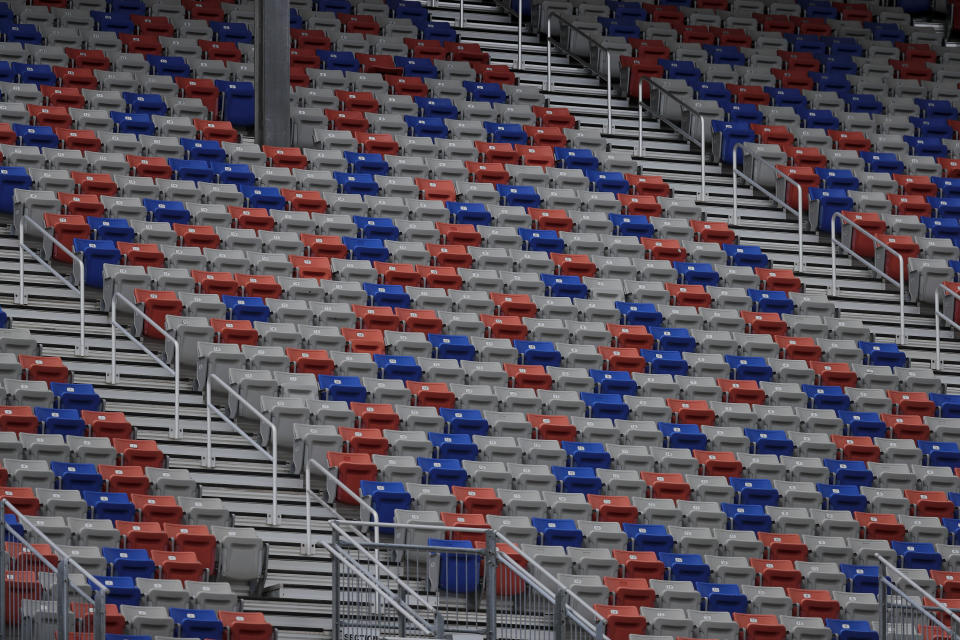 Empty stands are viewed during a NASCAR Cup Series auto race at Atlanta Motor Speedway, Sunday, June 7, 2020, in Hampton, Ga. (AP Photo/Brynn Anderson)