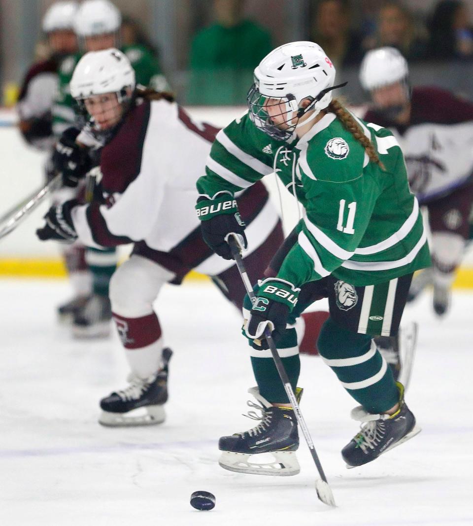 Canton Bulldog #11Georgia Campbell gets the buck across the blue line.
Falmouth girls hockey beats Canton 4-3 in overtime at The Bog in Kingston on Thursday, March. 6, 2024