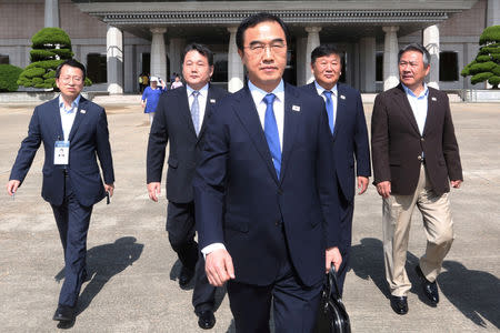 FILE PHOTO: South Korean Unification Minister Cho Myoung-gyon walks to board a plane to leave for Pyongyang, North Korea, to participate in the inter-Korean basketball matches, at Seoul Airport in Seongnam, South Korea, July 3, 2018. Ahn Young-joon/Pool via REUTERS/File Photo