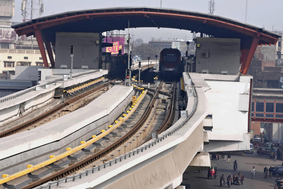 An Orange Line metro train is parked at a station following a power breakdown across the country, in Lahore, Pakistan, Monday, Jan. 23, 2023. Much of Pakistan was left without power for several hours on Monday morning as an energy-saving measure by the government backfired. The outage spread panic and raised questions about the cash-strapped government’s handling of the crisis. (AP Photo/K.M. Chaudary)