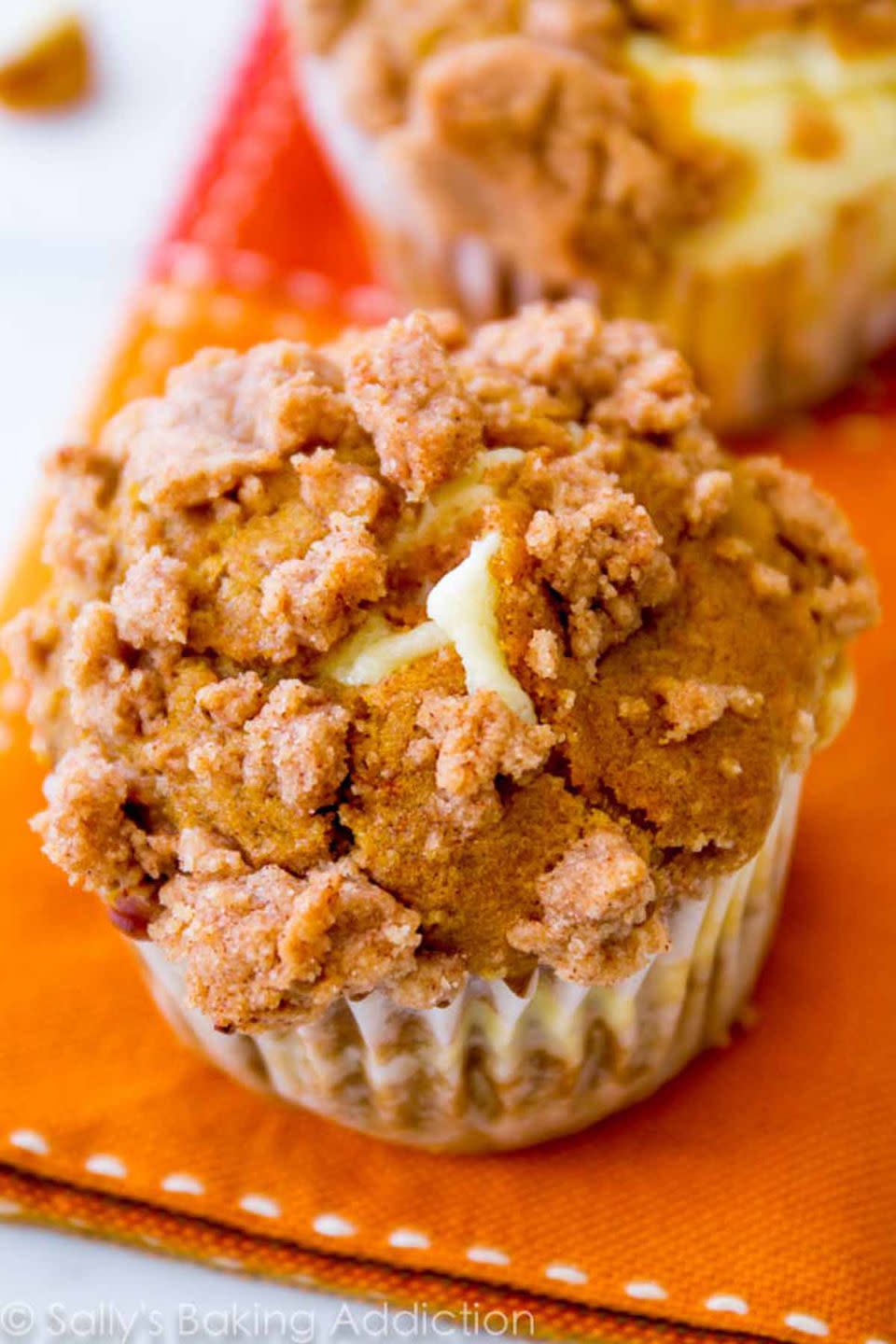 <p>You can easily sneak in something sweet for breakfast with these delicious pumpkin-spiced muffins.</p><p><strong>Get the recipe at <a href="http://sallysbakingaddiction.com/2013/10/24/pumpkin-cheesecake-muffins/" rel="nofollow noopener" target="_blank" data-ylk="slk:Sally's Baking Addiction;elm:context_link;itc:0;sec:content-canvas" class="link ">Sally's Baking Addiction</a>.</strong></p>