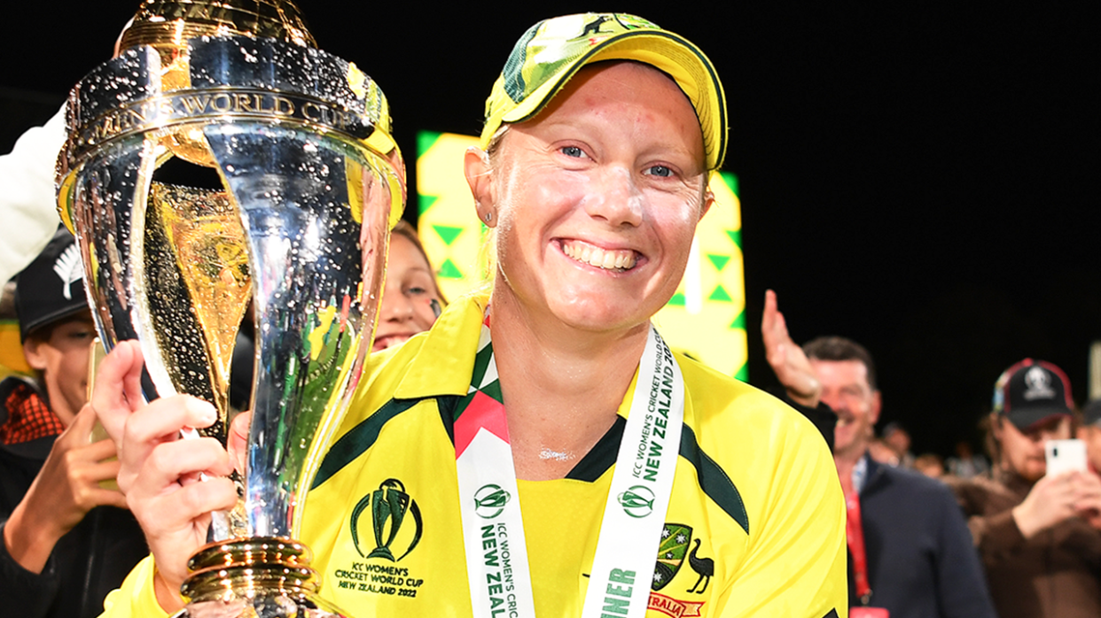 Alyssa Healy (pictured) holding the World Cup trophy.