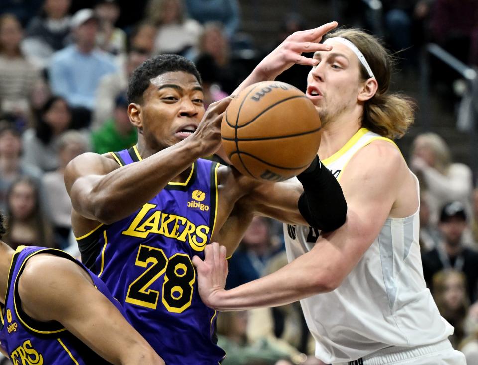 Los Angeles Lakers forward Rui Hachimura (28) and Utah Jazz forward <a class="link " href="https://sports.yahoo.com/nba/players/5164" data-i13n="sec:content-canvas;subsec:anchor_text;elm:context_link" data-ylk="slk:Kelly Olynyk;sec:content-canvas;subsec:anchor_text;elm:context_link;itc:0">Kelly Olynyk</a> (41) battle for the ball as Utah and Los Angeles play at the Delta Center in Salt Lake City on Saturday, Jan. 13, 2024. | Scott G Winterton, Deseret News