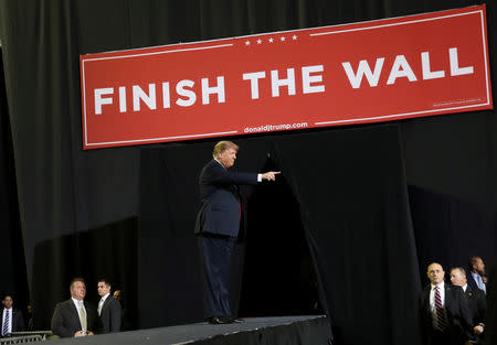 U.S. President Donald Trump gestures during a rally at El Paso County Coliseum in El Paso, Texas, U.S., February 11, 2019. REUTERS/Leah Millis/Files