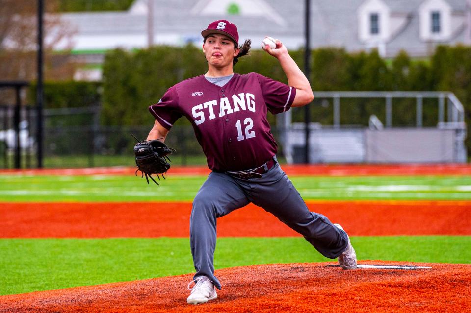 Bishop Stang's Aiden Cardoza fires to the plate.