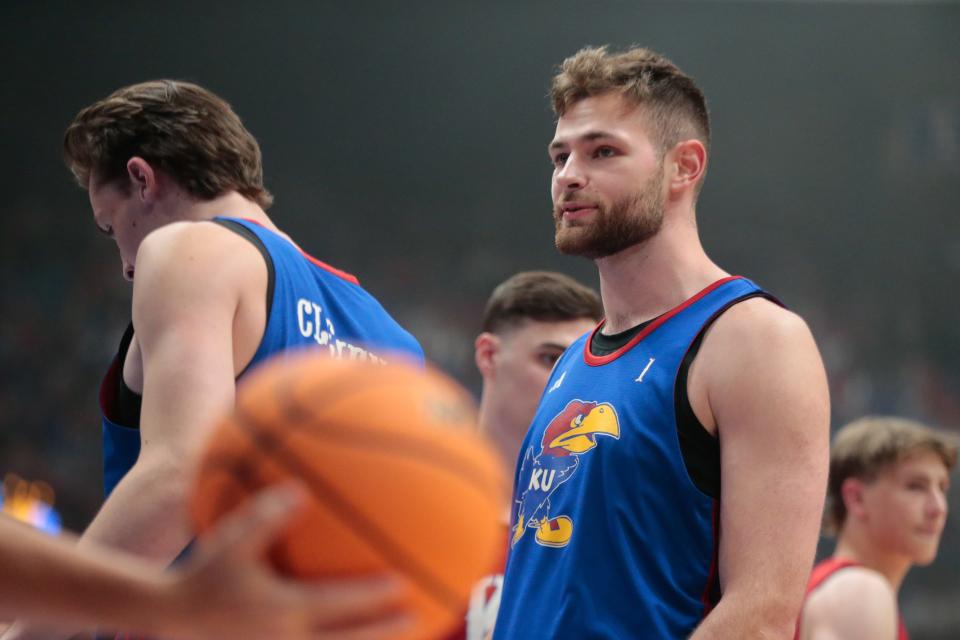 Kansas senior center Hunter Dickinson (1) walks down court during a scrimmage at Friday's Late Night in the Phog inside Allen Fieldhouse.