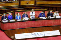 Italian Premier Giorgia Meloni, center, speaks as she is flanked from left; Italian Foreign Minister Antonio Tajani, President of the European Commission Ursula von der Leyen, President of the European Parliament Roberta Metsola, African Union President Azali Assoumani, African Union Commission Chairperson Moussa Faki Mahamat, President of the European Council Charles Michel and UN Deputy Secretary-General Amina Mohammed, at the Senate for the start of an Italy - Africa summit, in Rome, Monday, Jan. 29, 2024. Meloni opened a summit of African leaders on Monday aimed at illustrating Italy's big development plan for the continent that her government hopes will stem migration flows and forge a new relationship between Europe and Africa. (Roberto Monaldo/LaPresse via AP)