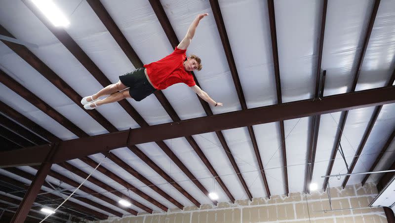 Simon Smith, of Springville, a gymnast representing Team USA for the upcoming Trampoline World Cup, works out in Orem on Thursday, June 29, 2023.