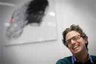 BuzzFeed's Founder and CEO Jonah Peretti reacts during an interview at the company's headquarters in New York January 9, 2014. REUTERS/Brendan McDermid