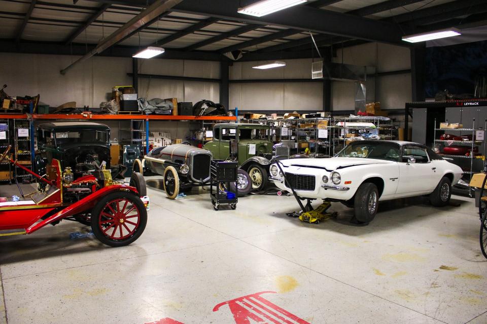 Various vehicles in stages of restoration are found throughout the shop at McPherson College's Automotive Restoration program.